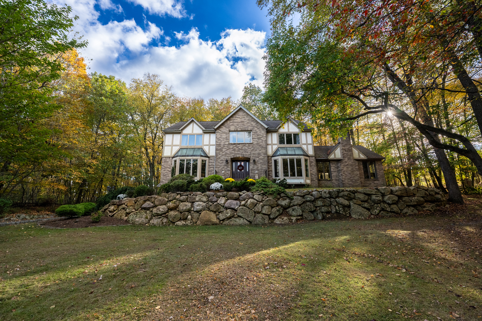 Exterior real estate photograph from the driveway